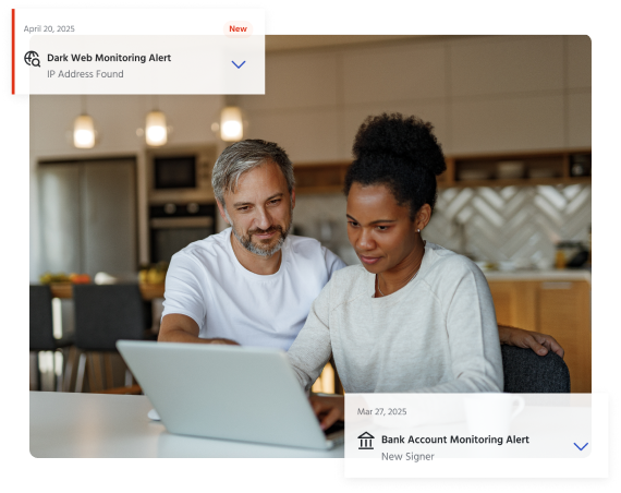 Couple checking Financial Shield Alerts